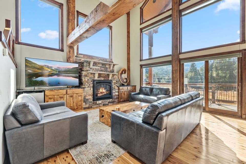 Living room (main floor): Gas fireplace, 65” Smart TV