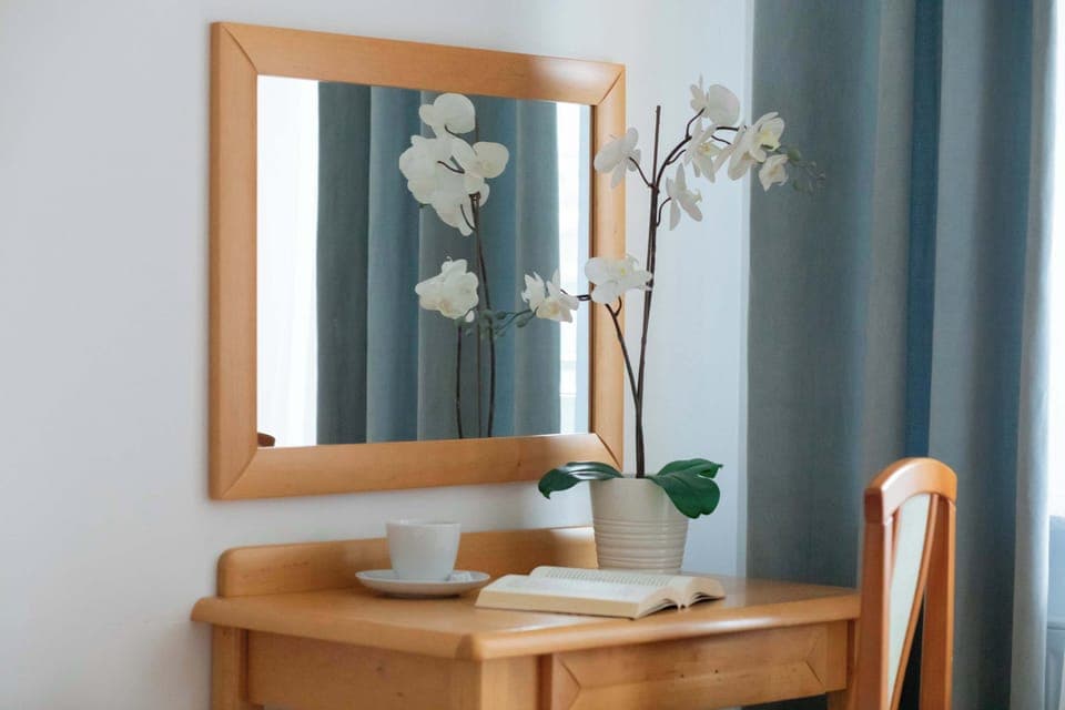 The bedroom's modern design ensures a comfortable stay.