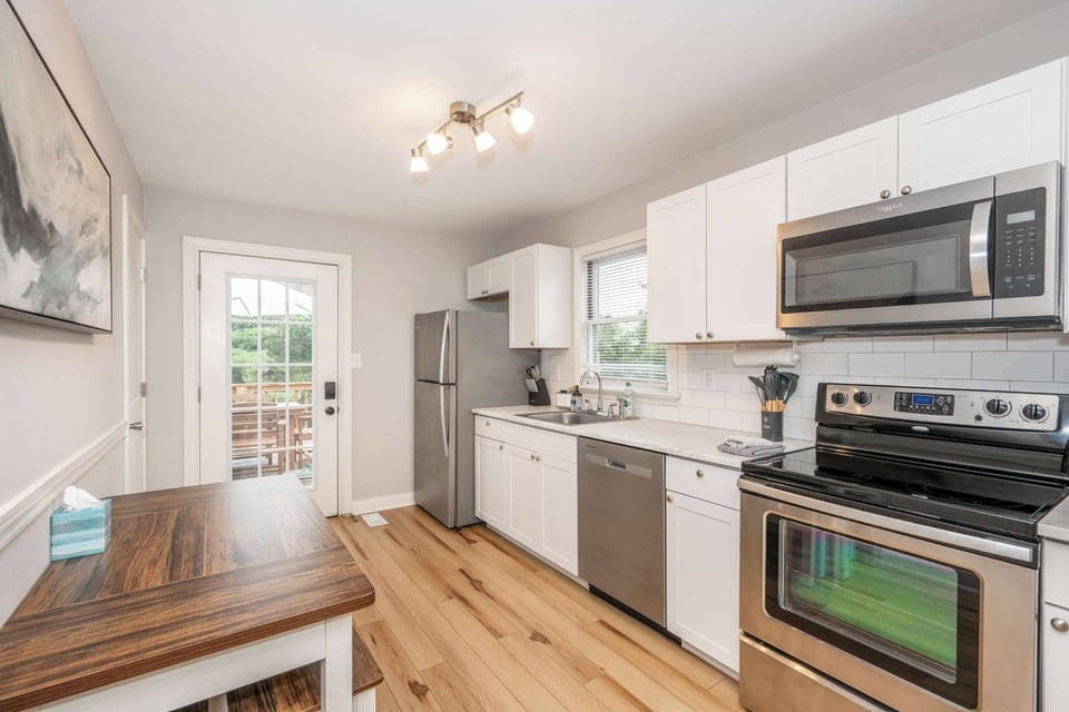 The open dine-in kitchen is well equipped for an unforgettable getaway​