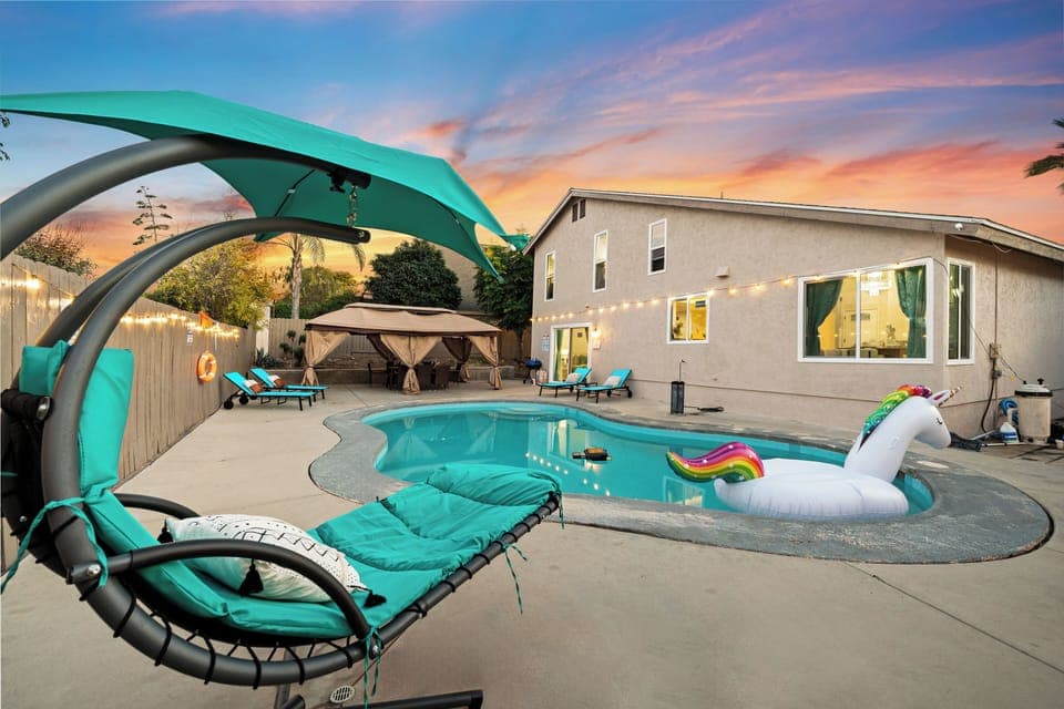 Unwind by the pool on comfortable sun loungers under the open sky.