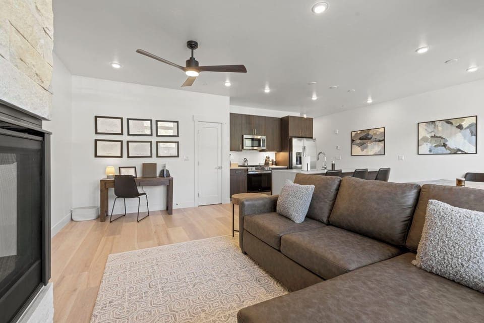 Living area with smart TV and gas fireplace.