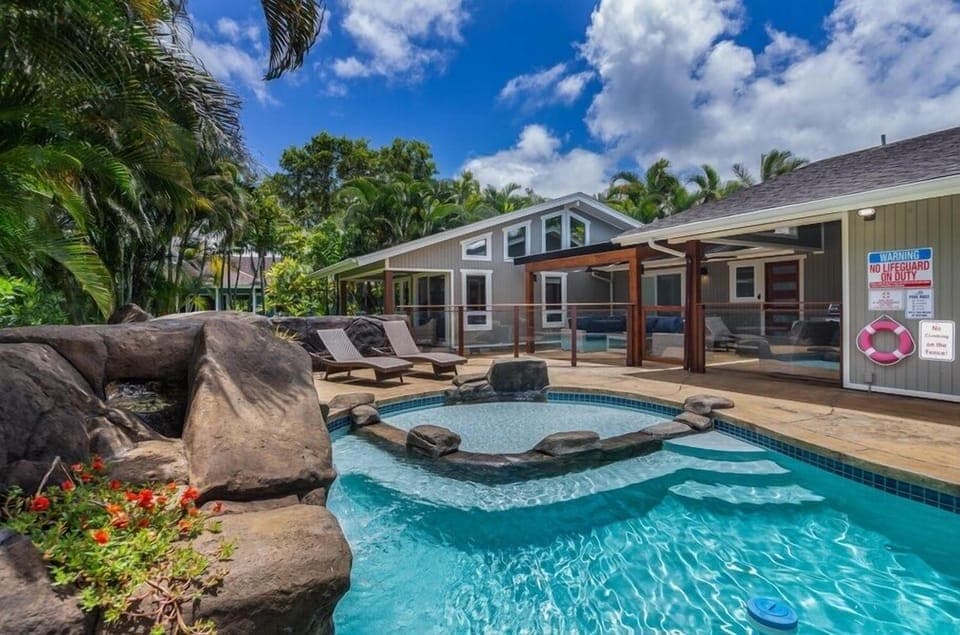 Lani Oasis welcomes you with a private saltwater pool framed by lava rock accents and tropical gardens, perfect for sunny afternoons in Princeville.