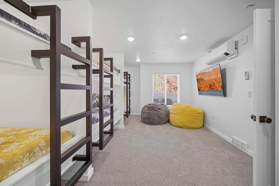 Sleepover heaven! 3 queen bunks, smart TV, and your own full ensuite bath!