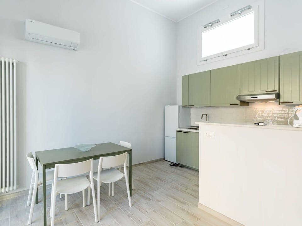 Flooring, Interior Design, Floor, Furniture, Ceiling, Room, Apartment, Chair, Home Appliance, Living Room