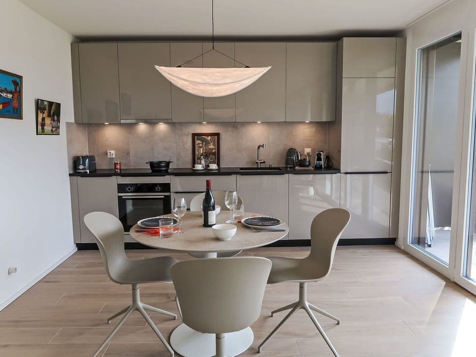 Furniture, Interior Design, Flooring, Light Fixture, Wood, Floor, Kitchen, Ceiling, Chair, Lighting