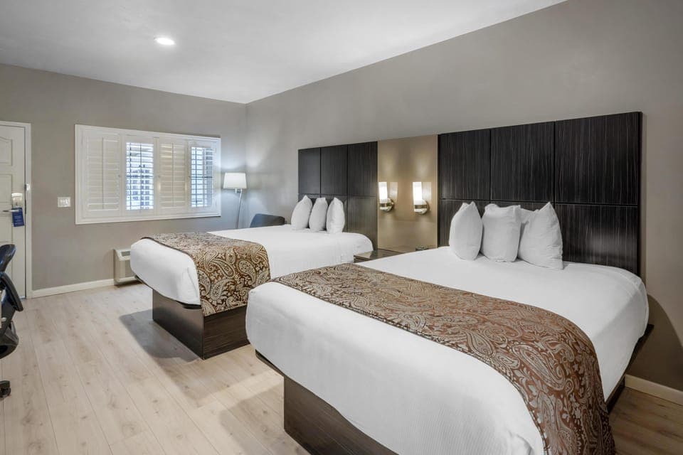 Standard Room, 2 Queen Beds, Non Smoking, Refrigerator & Microwave | In-room safe, iron/ironing board, free WiFi, bed sheets