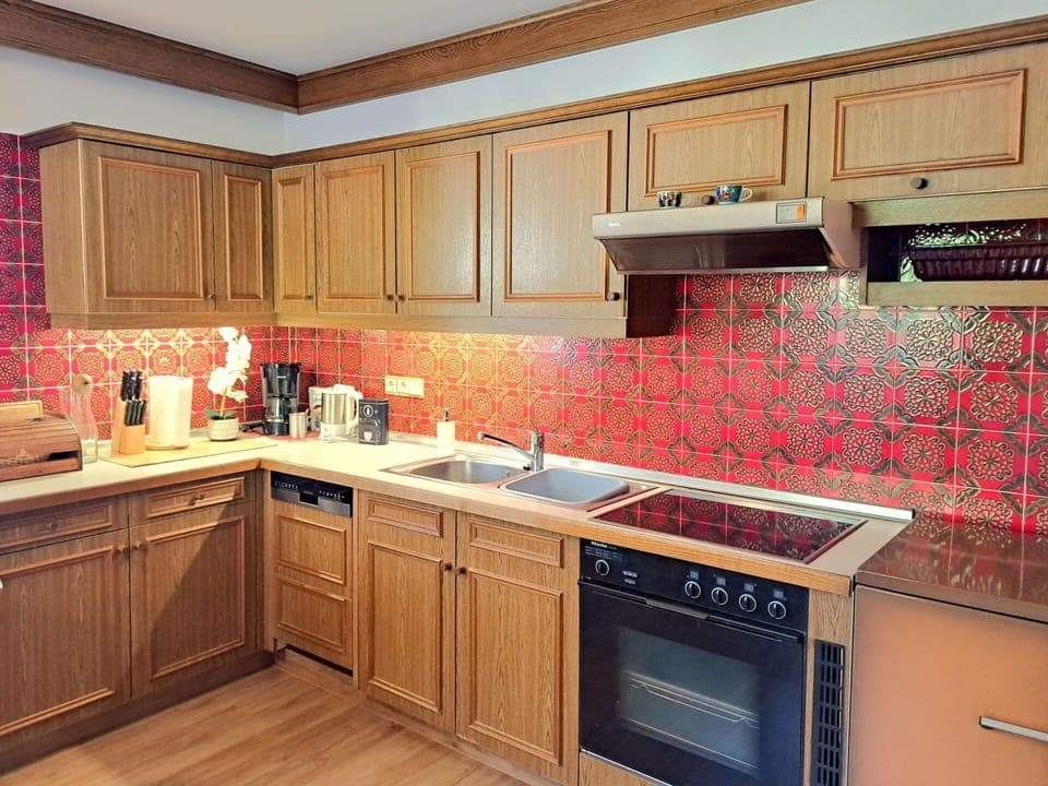 Kitchen, Red, Flooring, Cabinetry, Countertop, Kitchen Appliance, Floor, Interior Design, Tile, Major Appliance
