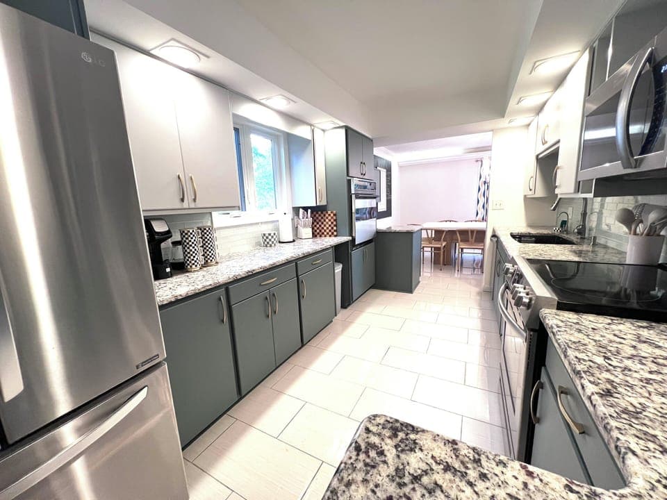 Kitchen fully equipped with pots and pans, silverware, etc