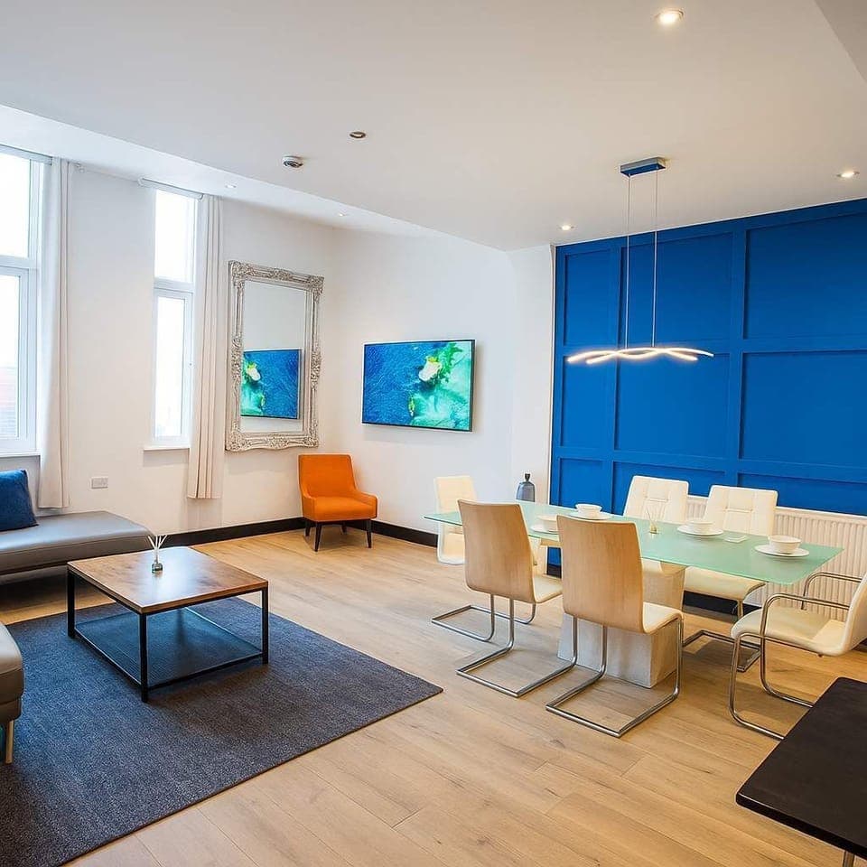 Enjoy this spacious, light living dining room with large windows and all the comforts you would expect