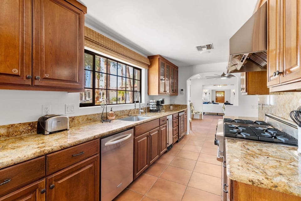 Chef's kitchen with modern stainless steel appliances