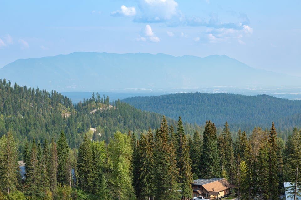 Expansive mountain views of Flathead Valley and the surrounding area. | Exterior