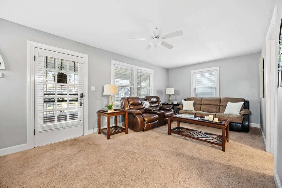 Living Area: Bright and cozy living room designed for comfort after a day exploring Louisville.