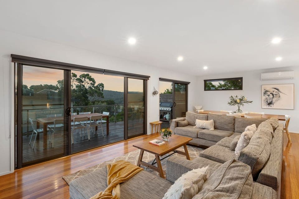 The light and spacious living area is a delight to relax in
