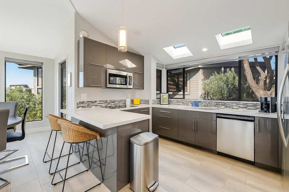 Sleek countertops, skylights, and everything you need to cook in comfort.