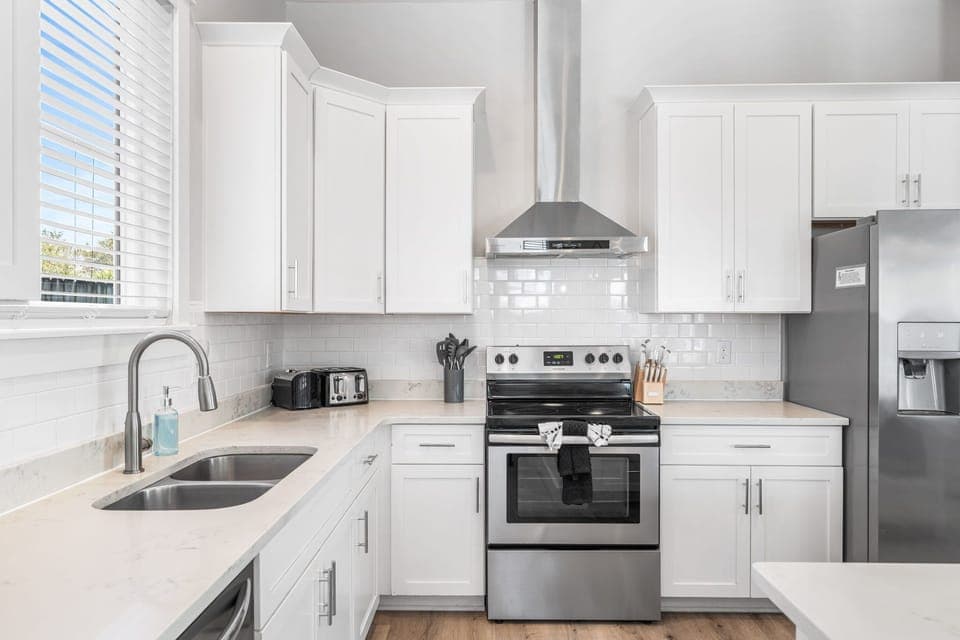 Crisp design and modern touches create a welcoming culinary retreat.