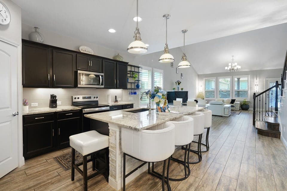 Kitchen + Dining  “A chef‑ready kitchen designed for cooking, gathering, and great conversations.”