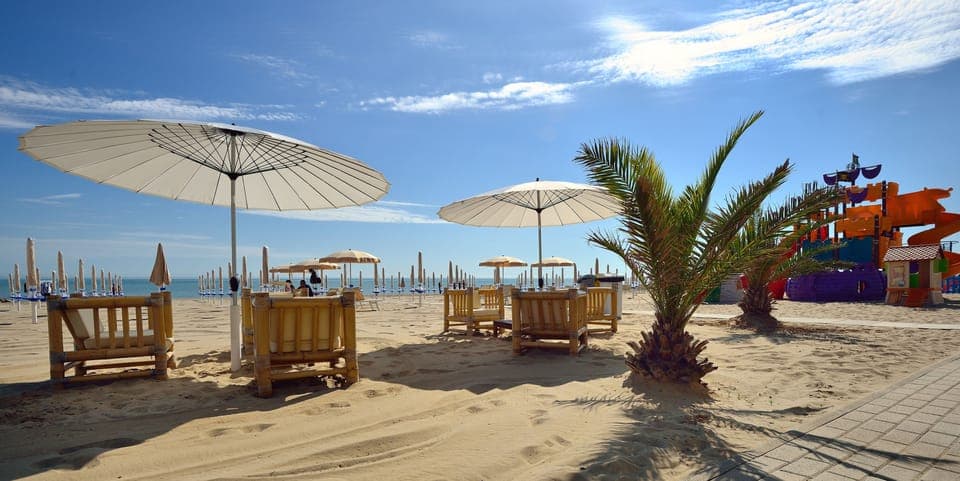 Private beach, sun loungers, beach umbrellas, beach volleyball