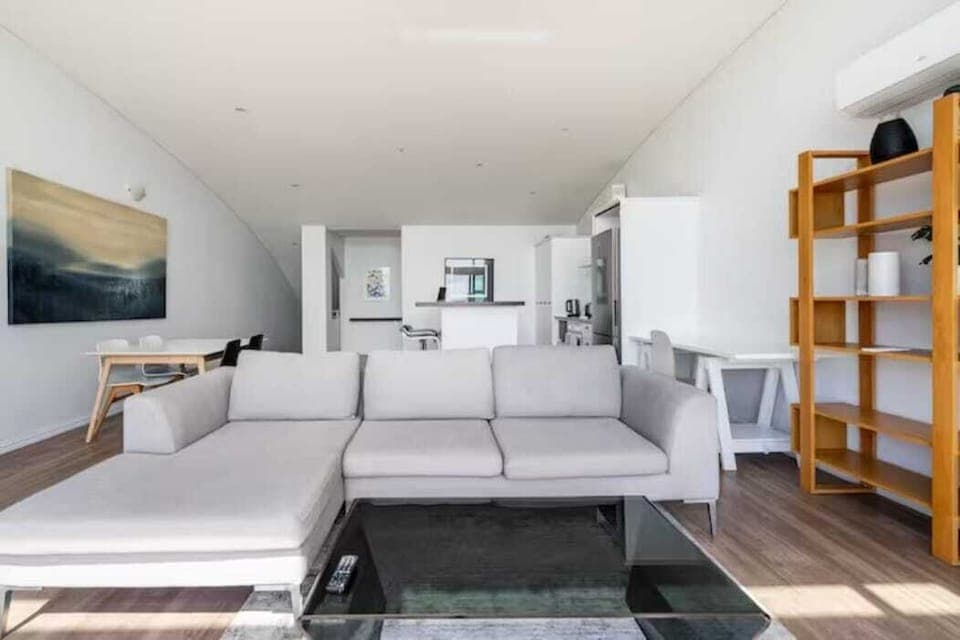 Relax in the spacious living room with two sofa beds, and modern decor