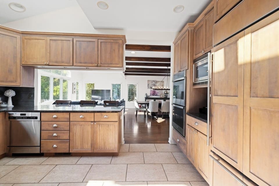 Kitchen opens to cozy living room.