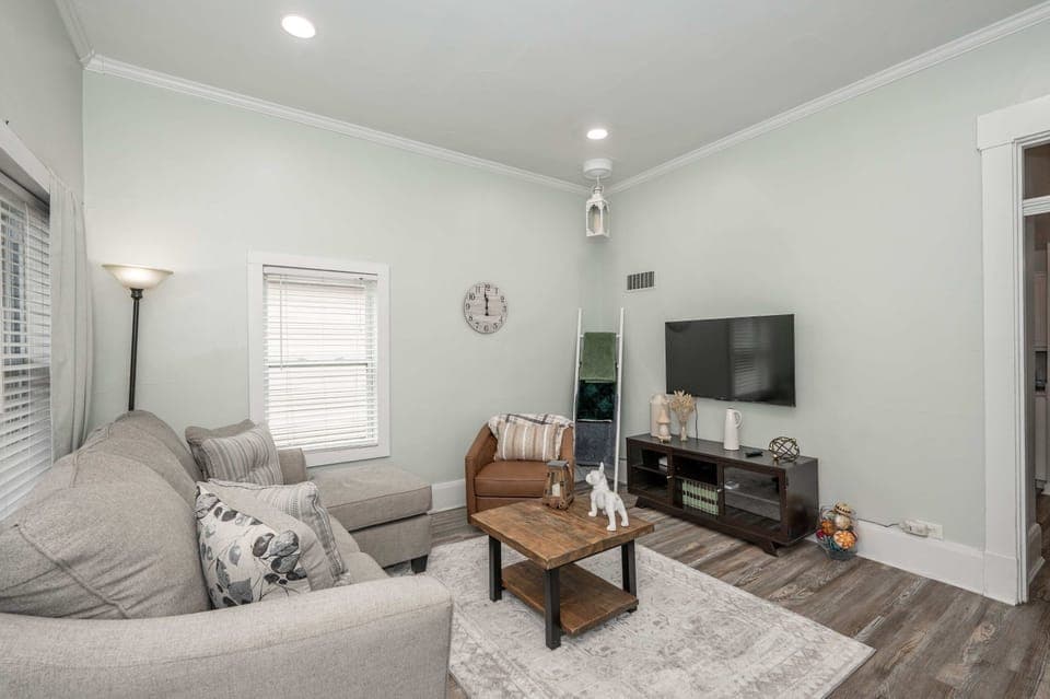 Curl up in the airy living room & stream your favorites on the smart TV​