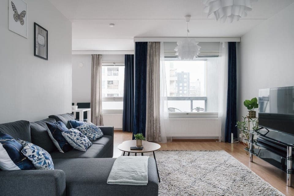 The bright and open living room is the perfect place to gather and relax.