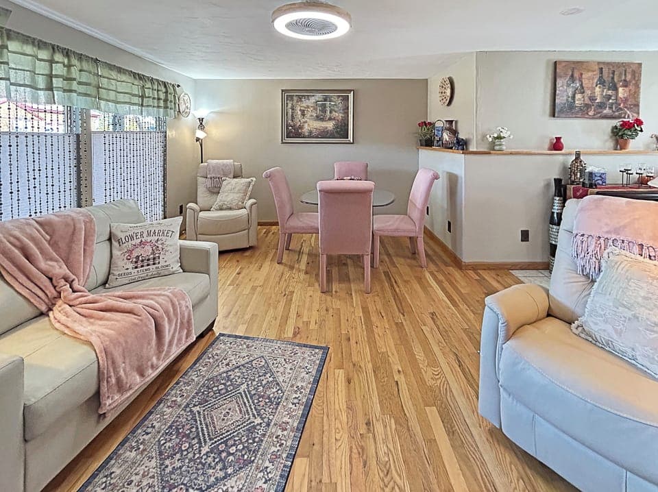Fully equipped kitchen with modern appliances and rustic charm.