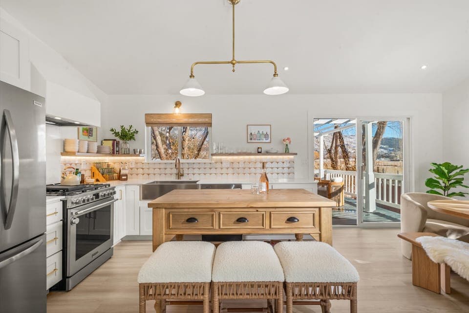 Thoughtful design details, open shelving, and plenty of prep space.