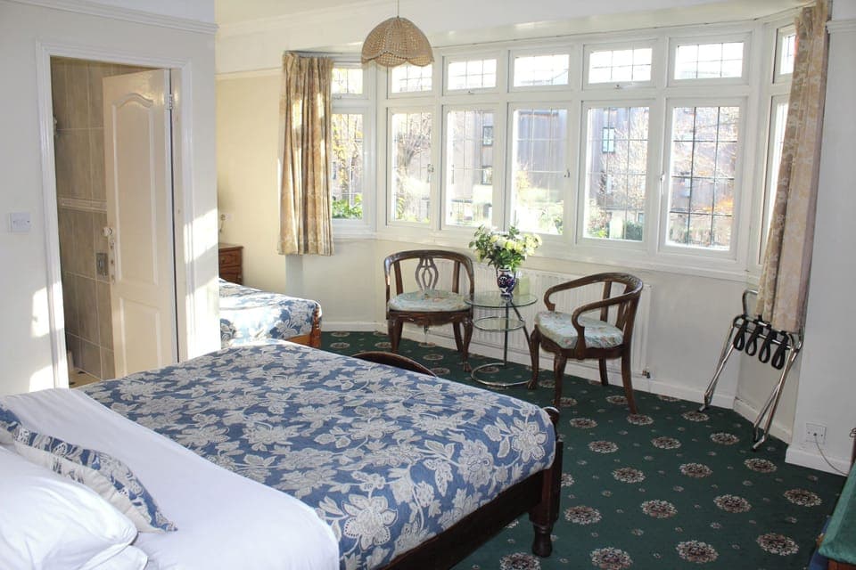 Family Triple Room | Iron/ironing board, free WiFi, bed sheets