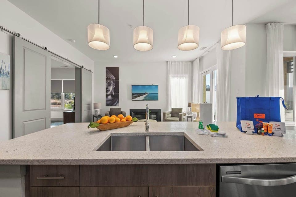 Our fully equipped kitchen offers premium finishes, designer lighting, and ample counter space for preparing coastal meals.