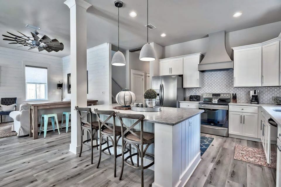 A spacious kitchen designed for gathering, cooking, and easy conversation.