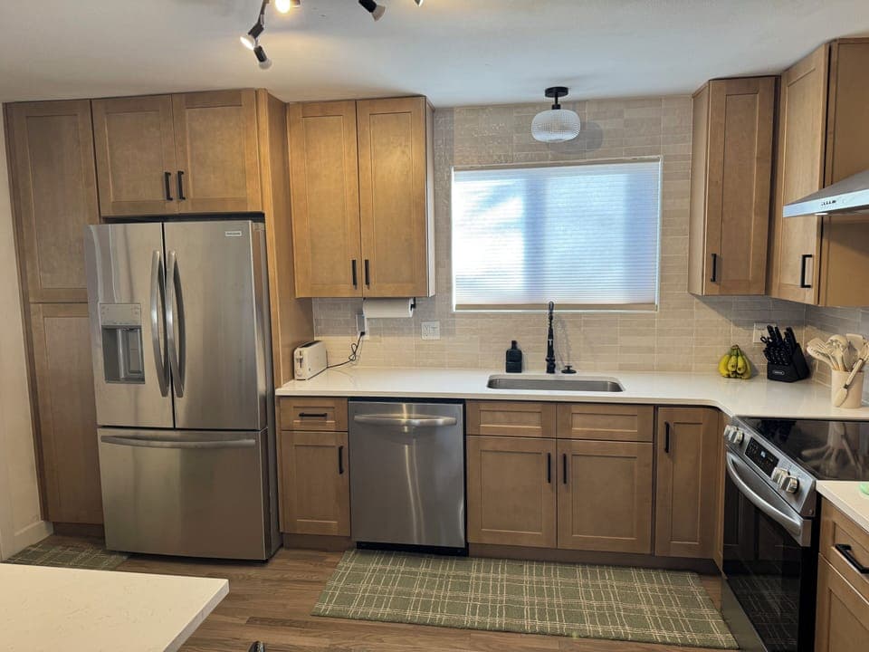 Full pantry and select empty cupboards for guest storage 