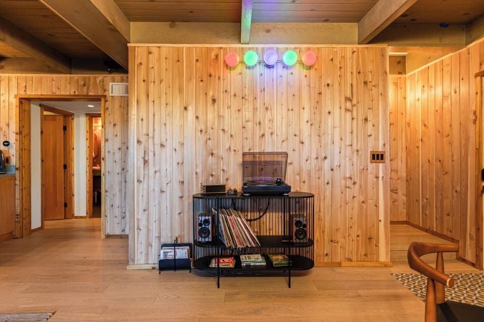 Unwind in the living area equipped with a TV and a kitchenette.