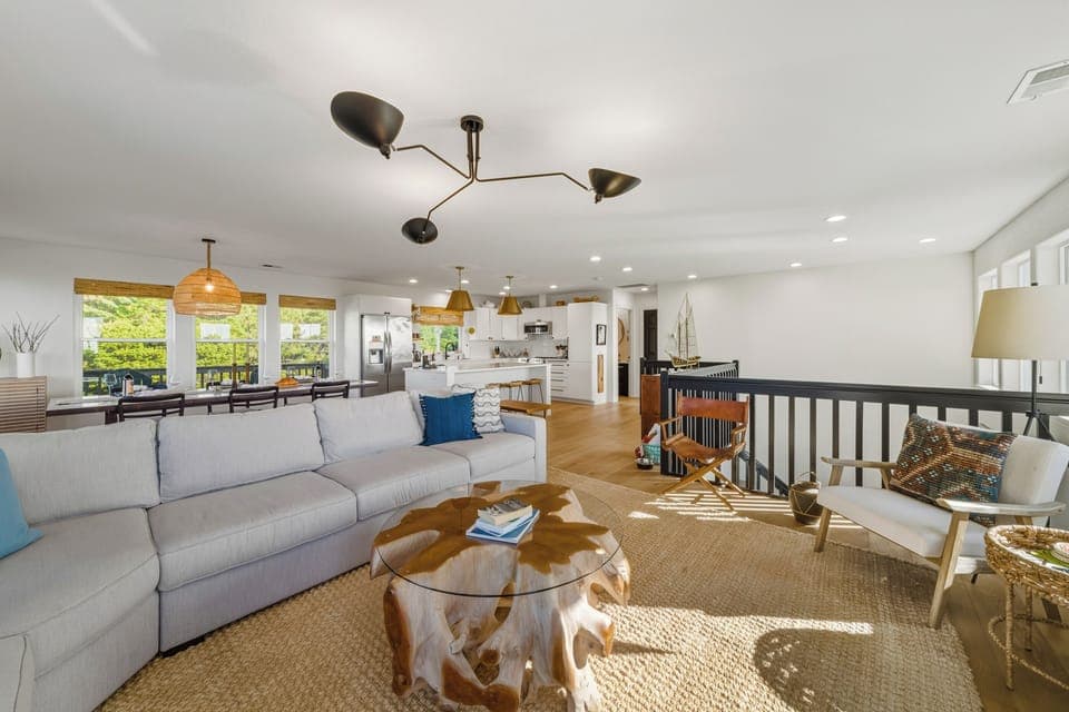 Open living space with comfy furniture to snuggle on while watching your favorite show on streaming TV with the gas fireplace giving you great atmosphere.