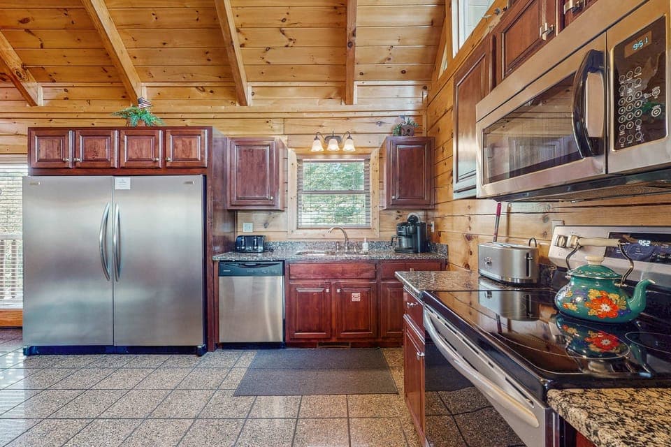 Whip up culinary delights in this spacious, modern kitchen with stunning wood accents!