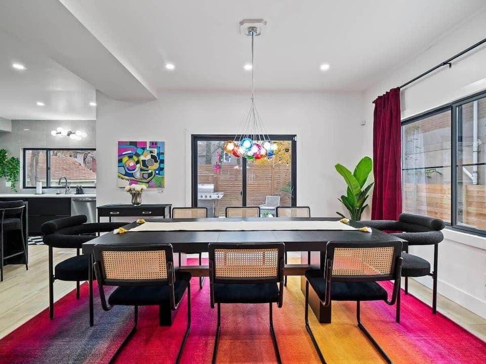 Sunlit dining space framed by lively art & soft textures for easy hangs.
