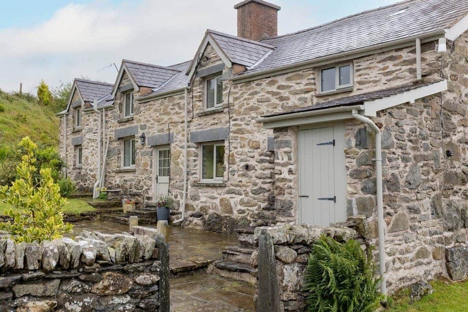 Front door, patio and garden. 