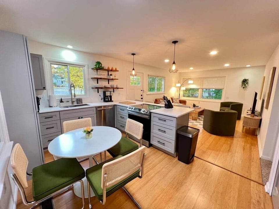 Dining table for 4,  as well as, bar seating for 4