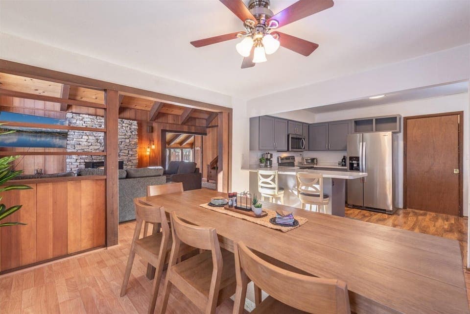 The open concept dining area and kitchen allows everyone to stay connected during meals.