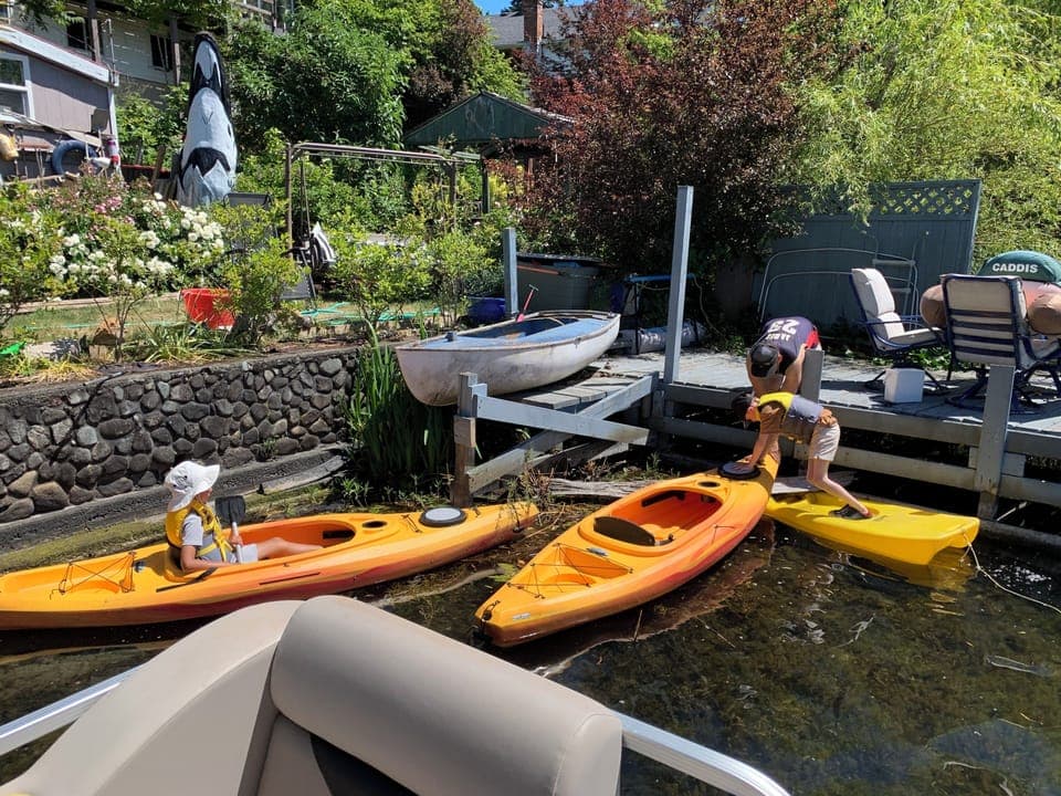 All the toys and little boys on a small beach