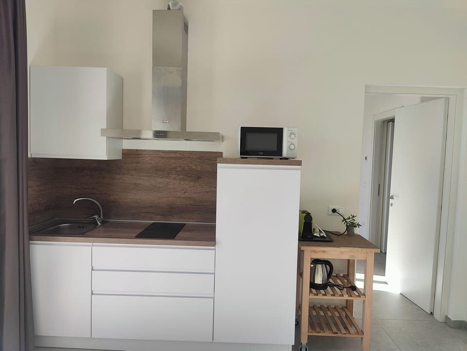 Fior di Loto | Private kitchen | Espresso maker, coffee/tea maker, electric kettle, dining tables