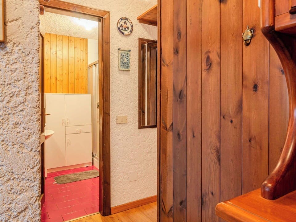 Wall, Flooring, Wood, Floor, Interior Design, Door, Wood Stain, Brown, Room, Hardwood