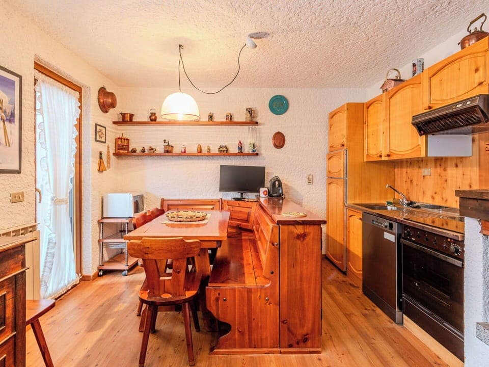 Furniture, Interior Design, Wood, Kitchen, Countertop, Cabinetry, Flooring, Room, Ceiling, Floor