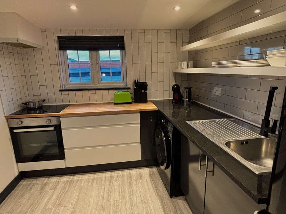 Full Kitchen with cooking utensils and cookware to create the perfect snack or meal