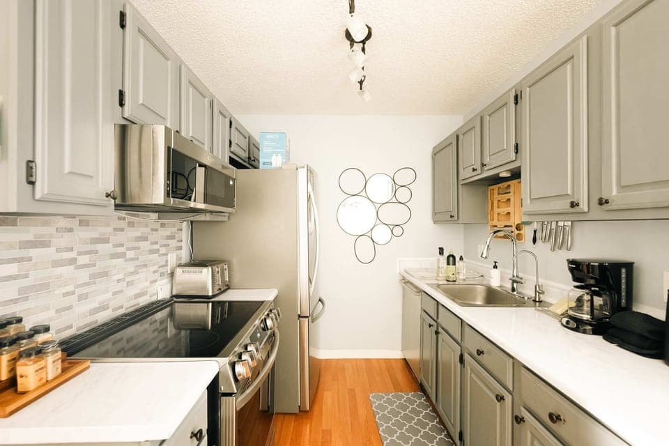 Kitchen with stainless-steel appliances