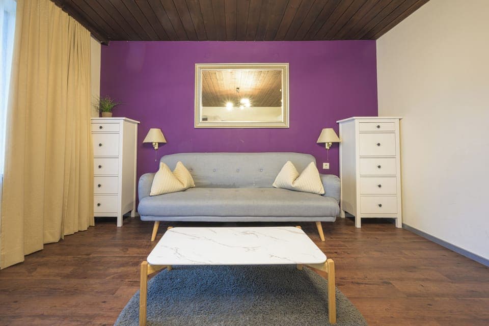 Quadruple Room, Balcony | Living area