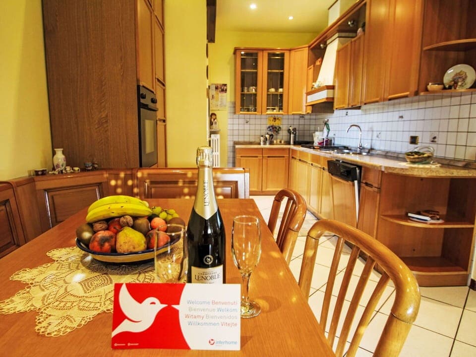 Furniture, Wood, Interior Design, Flooring, Floor, Kitchen, Ceiling, Lighting, Countertop, Room