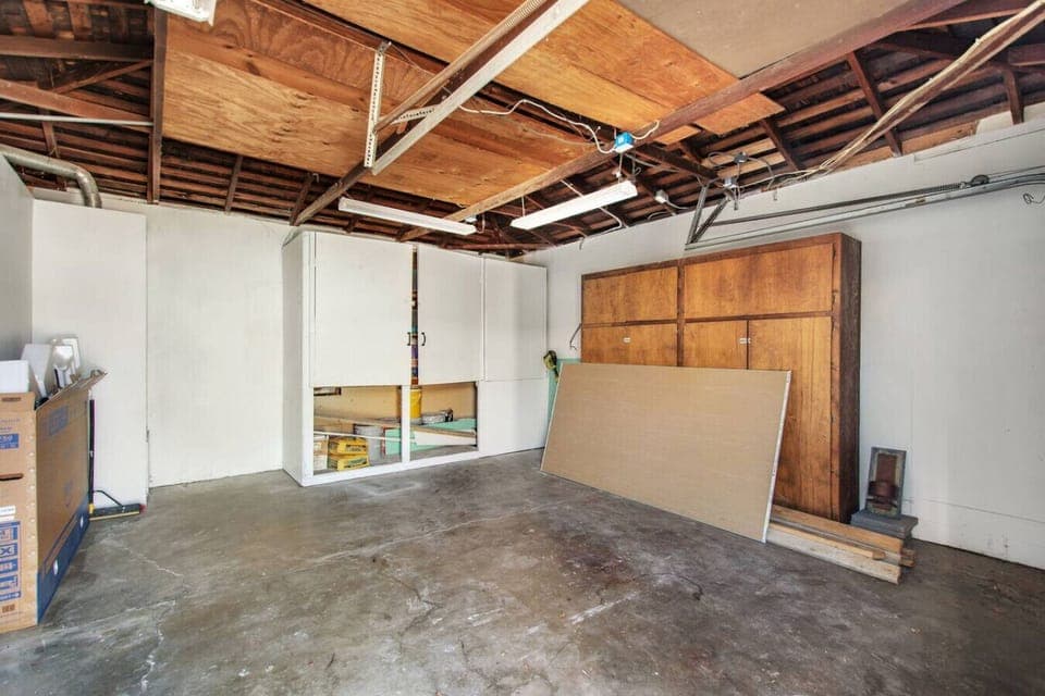 Garage access available for parking and storage.