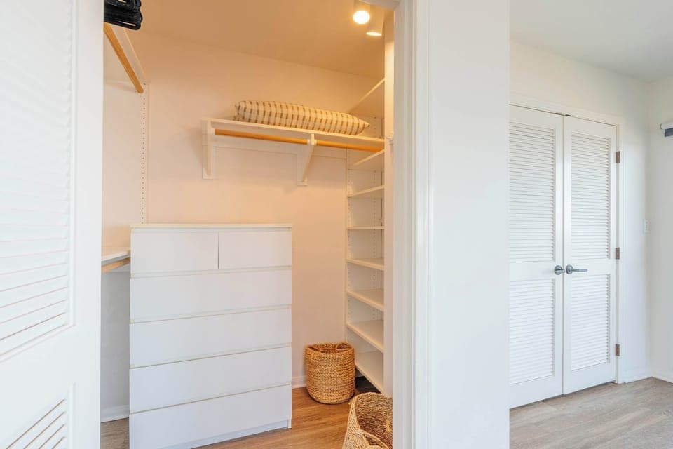 The master closet offers ample storage with thoughtful design, ensuring everything is easily accessible.