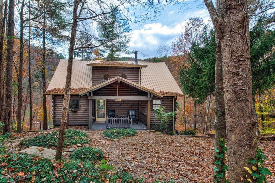 Charming cabin retreat awaits. And, embrace the serene forest views from the inviting front porch!