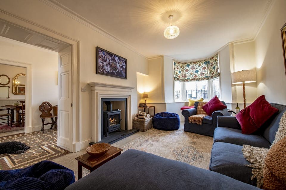 The Old Manse, Middleham: Delightful sitting room featuring a wood burning stove